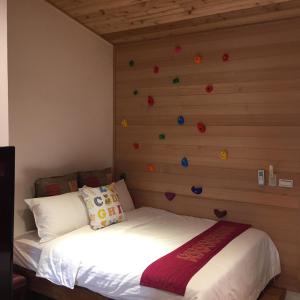 Voodi või voodid majutusasutuse Shang Shui Yun Ji B&B toas