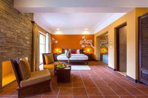 Llit o llits en una habitació de Temple Tree Resort & Spa
