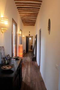 a hallway of a home with a wooden ceiling at Villa Marisella in Kiwengwa