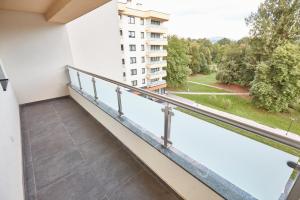 a balcony with a view of a building at Apartments Panamera in Sarajevo