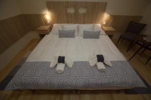 A bed or beds in a room at Holiday Home Podium