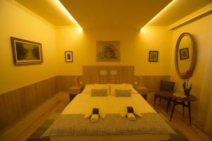 A bed or beds in a room at Holiday Home Podium