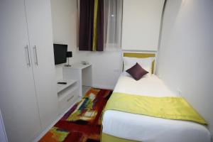 Katil atau katil-katil dalam bilik di Hotel Boutique Libris
