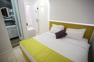 Katil atau katil-katil dalam bilik di Hotel Boutique Libris