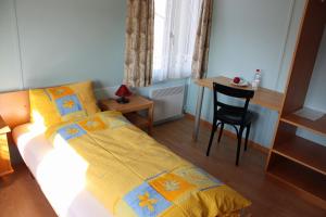 Postel nebo postele na pokoji v ubytování Hotel Restaurant Koi-Gartenteich