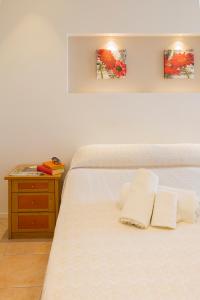 Postel nebo postele na pokoji v ubytování Hotel Pacific