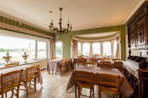 Posezení v ubytování Arconaty Hotel