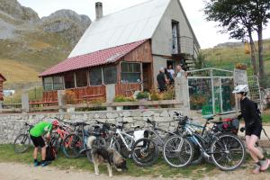 a group of bikes parked in front of a house at Rural Household MINIĆ - Kapetanovo jezero in Kolašin