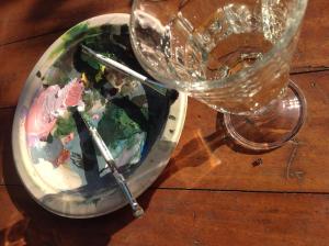 a bowl of salad and a wine glass on a table at Domaine Charente - Holiday Home with own garden in Mazières +25 photos