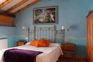 Postel nebo postele na pokoji v ubytování Hotel Rural El Perdigón