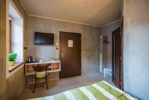 TV a/nebo společenská místnost v ubytování Penzion Čokolaterie