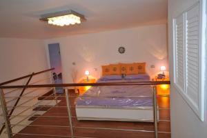 Postel nebo postele na pokoji v ubytování Golden Bay