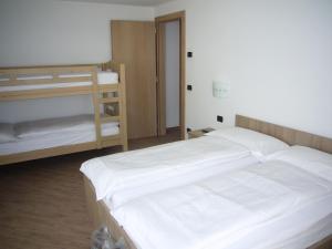 Postel nebo postele na pokoji v ubytování Casa Marisa