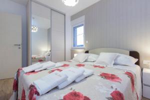 Postel nebo postele na pokoji v ubytování Villa Bareta 2