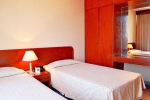 Krevet ili kreveti u jedinici u okviru objekta Hotel Manduara