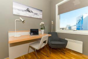 TV a/nebo společenská místnost v ubytování Fast Hotel Svolvær