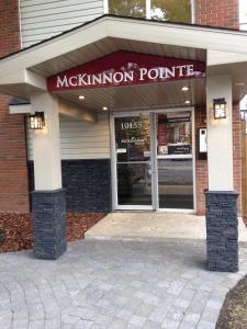 a store front of a magnkin pointrite at McKinnon Pointe #102 in Edmonton