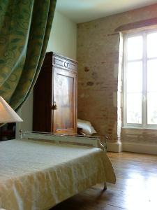 Voodi või voodid majutusasutuse Château de Gerbe toas
