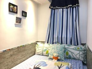 Una cama o camas en una habitación de Hong Kong Hostel (Tsim Sha Tsui Mansion)