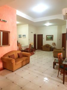 A seating area at Lena Hotel