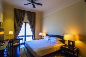 Voodi või voodid majutusasutuse Galle Face Hotel toas