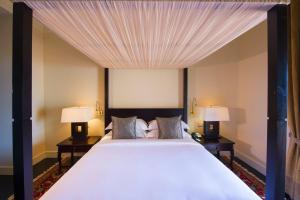 Voodi või voodid majutusasutuse Galle Face Hotel toas