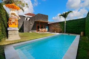 Swimmingpoolen hos eller tæt på The Apartments Canggu