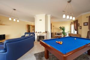 a living room with a pool table at Ericeira Sunset Lifestyle I in Ericeira