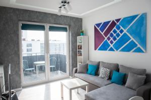 Posedenie v ubytovaní Apartament Winogrady Hawelańska