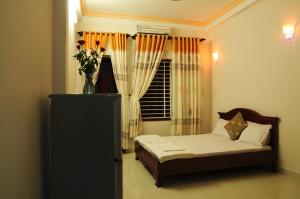 Giường trong phòng chung tại Diep Anh Guest House