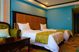 Кровать или кровати в номере Hohhot Level of Details