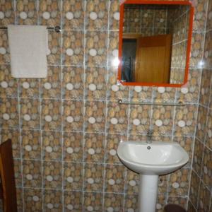 Ein Badezimmer in der Unterkunft La Venise Malienne