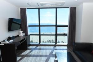 TV a/nebo společenská místnost v ubytování MS Hotel Haeundae