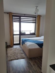 Ένα ή περισσότερα κρεβάτια σε δωμάτιο στο Apartment "Central"