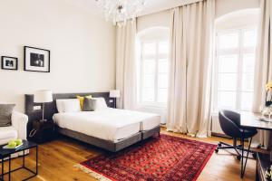 Posteľ alebo postele v izbe v ubytovaní Adele Apartments