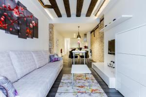 a living room with a couch and a table at Welcoming Apart Old Town in Pamplona