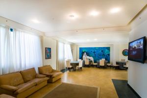 TV a/nebo společenská místnost v ubytování Hotel La Playa Blanca
