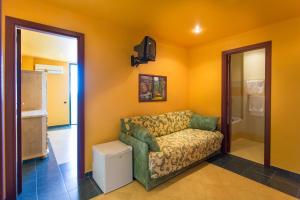 Postel nebo postele na pokoji v ubytování Hotel La Playa Blanca