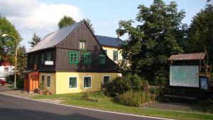a small house on the side of a road at U Jindrů in Abertamy