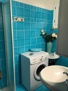 Phòng tắm tại Villino Le Luccine bilo