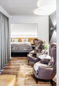 Posezení v ubytování Seevital Hotel & SPA - Ihr 4 Sterne Superior Hideaway direkt am See