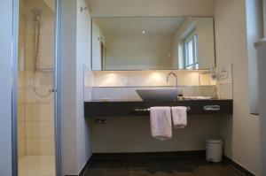 
Ein Badezimmer in der Unterkunft Flair-Hotel Neeth
