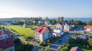 an aerial view of a small town with houses at Willa Magnolia in Władysławowo