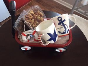 a tray of food and mugs and peanuts on a table at Clegg's Hotel in Ocean Beach