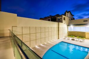 Bazén v ubytování Ribai Hotels - Barranquilla nebo v jeho okolí