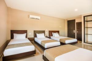 Postel nebo postele na pokoji v ubytování Ribai Hotels - Barranquilla