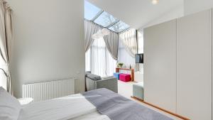 Postel nebo postele na pokoji v ubytování Villa 21 by Victus