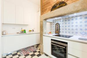 Køkken eller tekøkken på Lisbon Secret & Charming Baixa 4 bedroom apartment