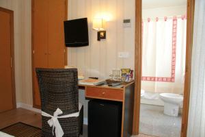 TV a/nebo společenská místnost v ubytování Hostal Paris