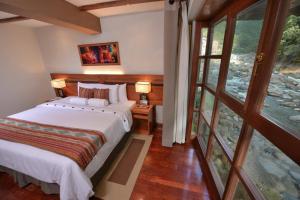 Cama ou camas em um quarto em Casa del Sol Machupicchu mais 37 fotos